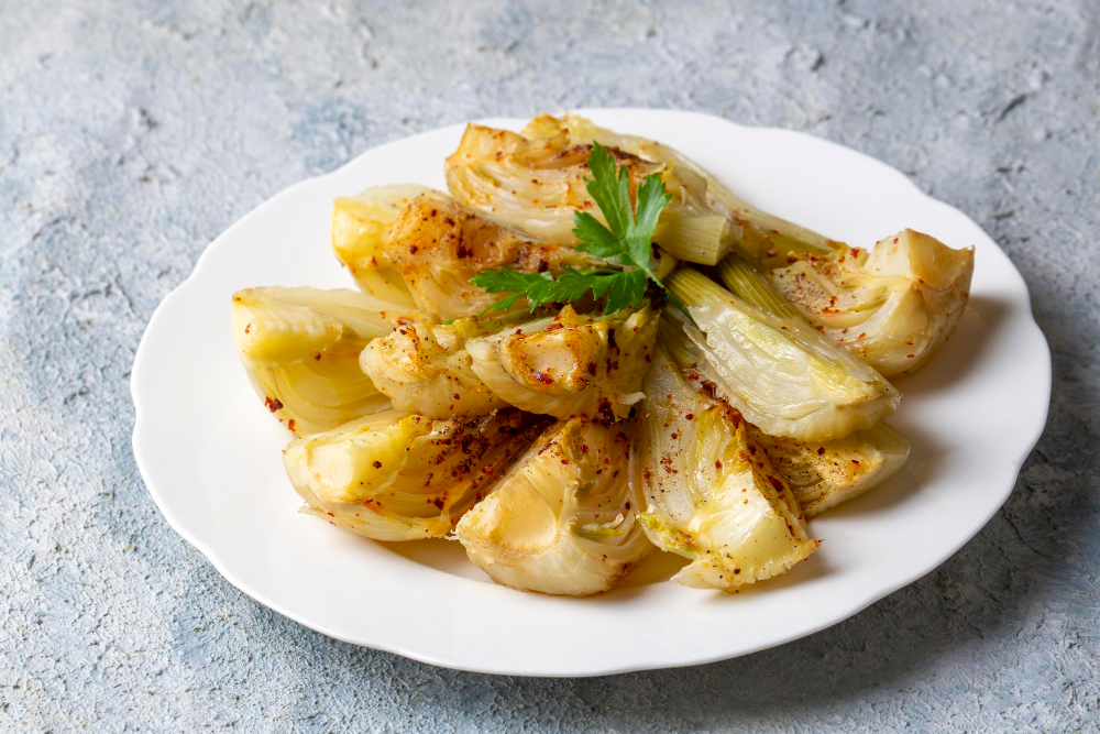Le braisage à la poêle, la cuisson qui transforme l'endive